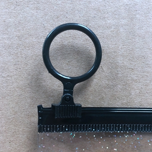 black zipper                                                                                          ring puller